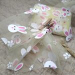 Tiul na metry cytrynowy w zajączki T15