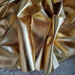 Tkanina błyszcząca złota 0,5m T58